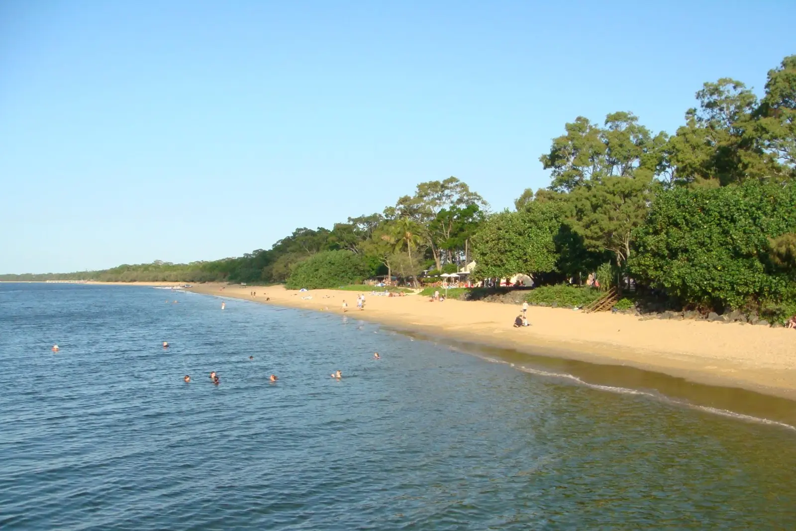 Calm shallows and sandy foreshore at Pialba Beach in Hervey Bay